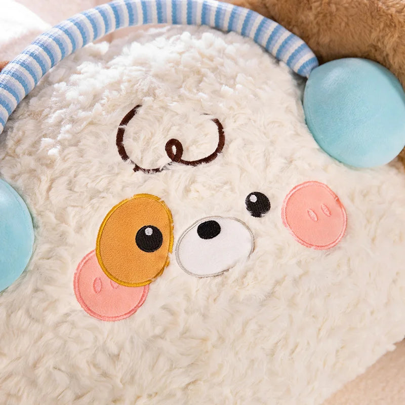 Close-up of a plush toy with a face made of colorful patches on a soft background.