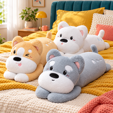 Three long puppy plush body pillows in silver gray, honey gold, and snow white arranged on a mustard bed in a colorful teal and coral bedroom.