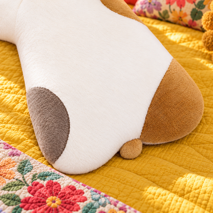 Close-up of the Calico lying cat plush pillow’s color panels and small rounded tail.