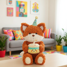 Plush teddy bear with a birthday hat and cake in a colorful living room.