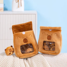 Two brown plushie bags with clear windows on a textured surface with a light blue background.