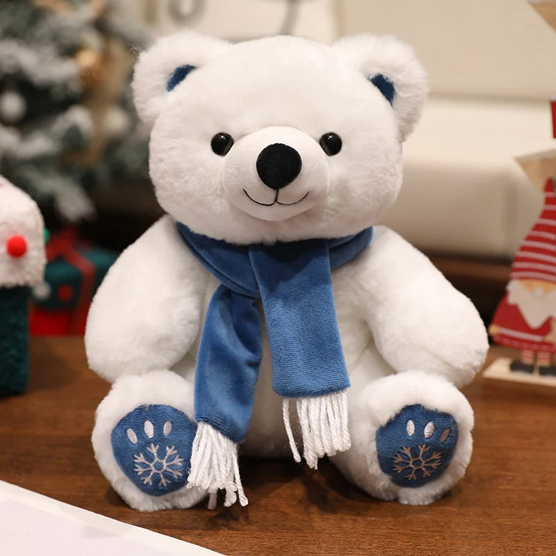 White teddy bear with a blue scarf on a wooden surface with a blurred background