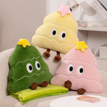 Three colorful plush toys resembling Christmas trees on a couch.