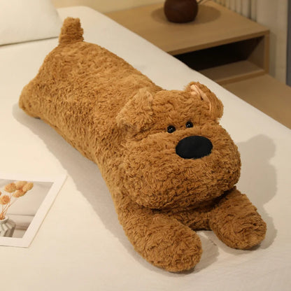 Brown dog plush toy on a white surface