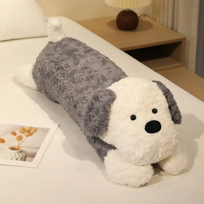 Dog-shaped pillow on a bed with a nightstand in the background