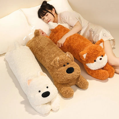 Person lying on a bed with animal-shaped body pillows