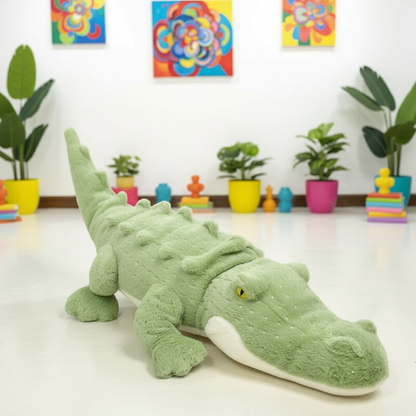 Green plush alligator toy on a white floor with colorful plants and toys in the background