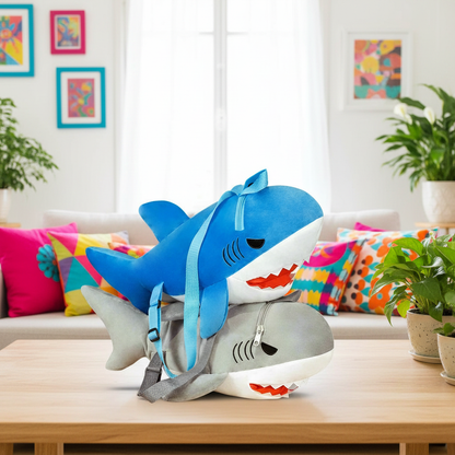 Shark-shaped plush backpack on a wooden table with a colorful living room background