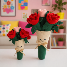 Two cute plush flower bouquets with smiling faces, wrapped in beige paper sleeves tied with tan ribbons, displayed on a white table in a colorful room setting.