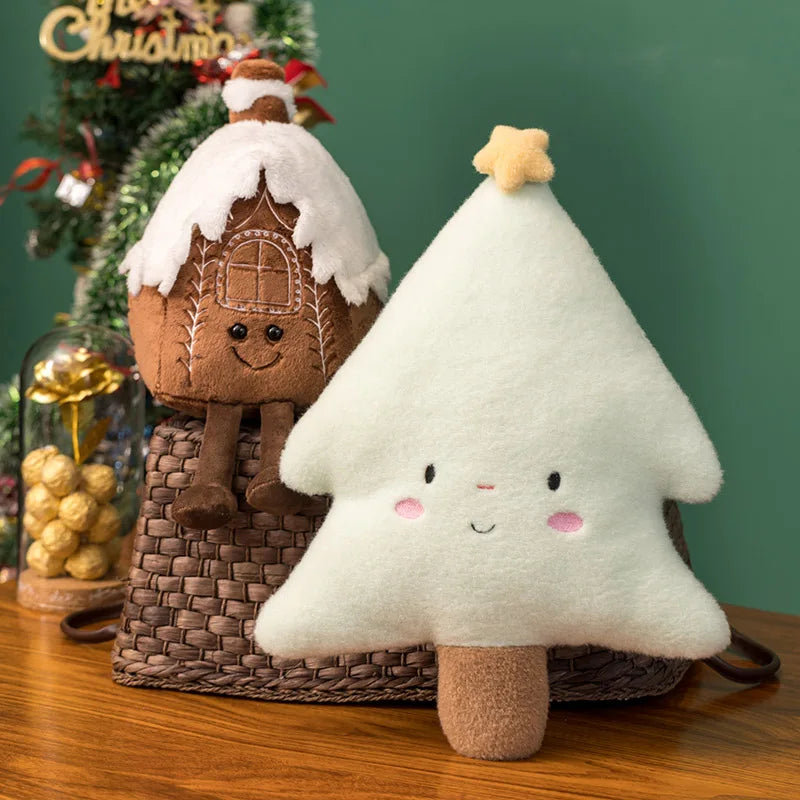 Plush toy gingerbread house and tree on a wooden surface with a festive background