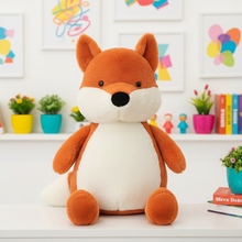 Plush fox toy on a shelf with a colorful background