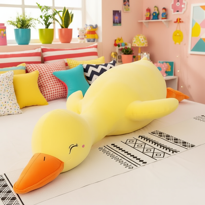Large yellow duck plush toy on a bed in a colorful room with pillows and plants.