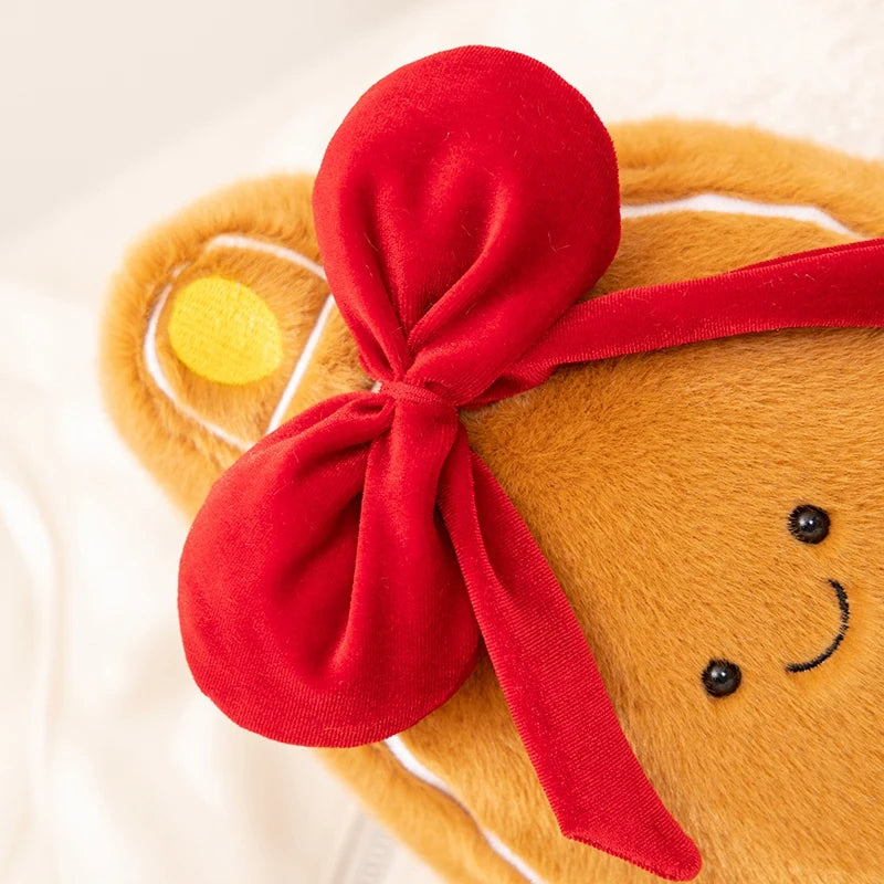 Gingerbread Bell Christmas Plushie Showing Close Up of Red Bow Details