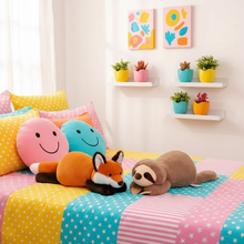 Colorful bedroom with pillows, plush toys, and wall art.