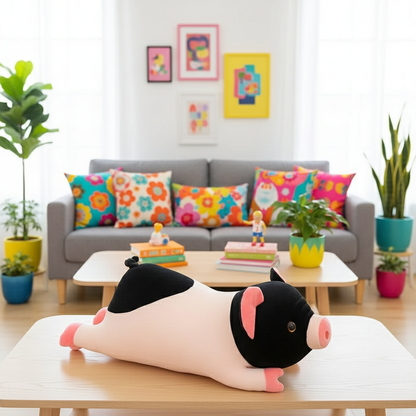Plush pig toy on a coffee table in a living room with colorful pillows and plants.