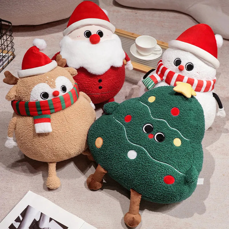 Four Christmas-themed plush toys including a reindeer, Santa Claus, snowman, and Christmas tree on a light-colored surface.