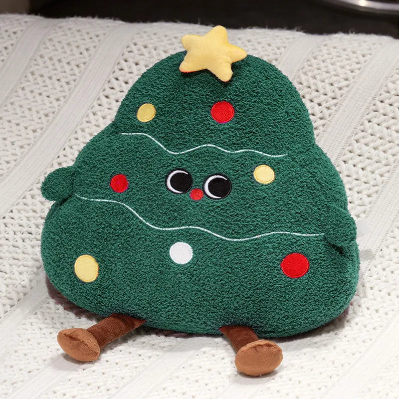 Plush toy shaped like a Christmas tree with a star on a white textured background
