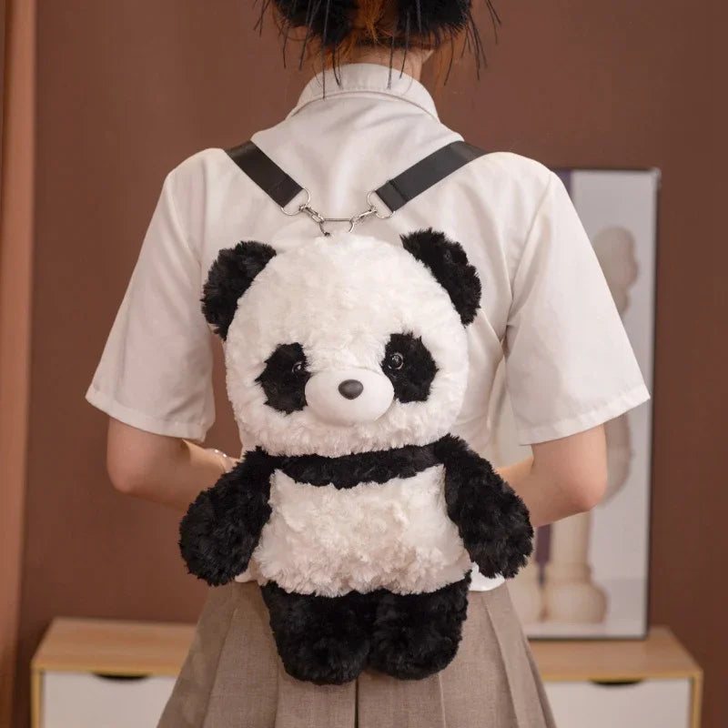 Person wearing a panda plush backpack against a brown wall.