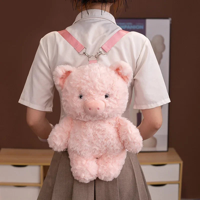 Person wearing a pink fluffy pig plushie backpack indoors