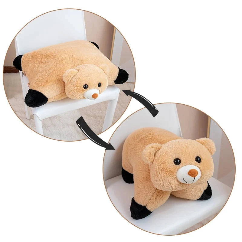 Plush bear toy on a white surface with a close-up inset showing details.