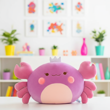 Purple crab plush toy with a crown in a colorful room setting