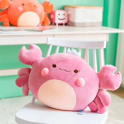 Purple plushie crab toy on a chair with a green wall and other toys in the background