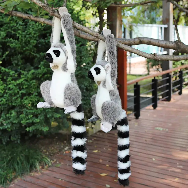 Leapin' Lemur Plushie hanging from a tree