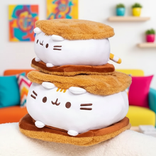Plush toy resembling a sandwich with cat faces on a colorful background