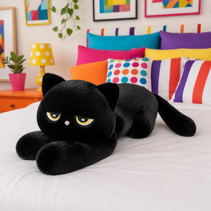 Giant black cat plushie body pillow laying on a bed in a colorful bedroom with colorful pillows.