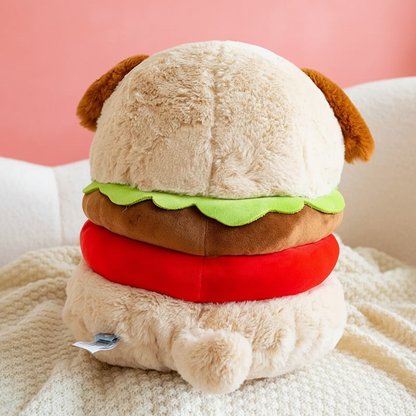 Plush toy shaped like a hamburger with a pink background
