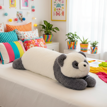 Panda plushie body pillow laying on a bed in a colorful bedroom setting