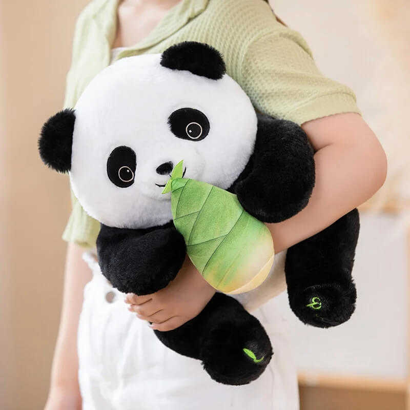 Panda Bamboo Delight plushie being carried