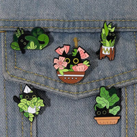 Petal Prowess Enamel Pin Series cat and plant lapel on jean shirt