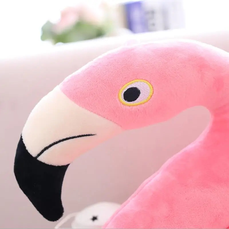 Close-up of a pink flamingo plush toy with a blurred background