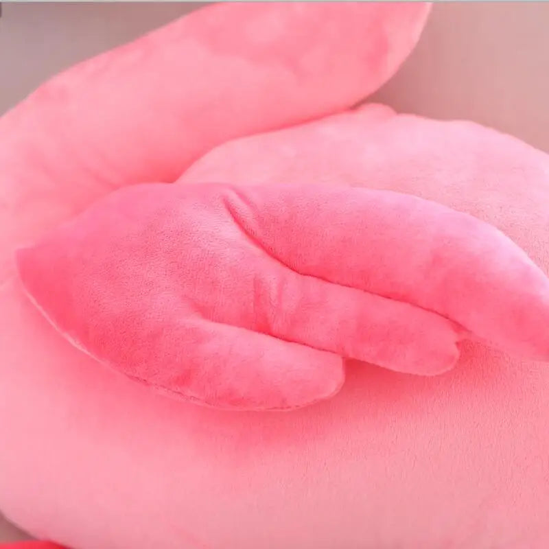 Close-up of a pink plush toy with a soft texture