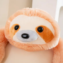 Close-up of a plush sloth toy with a soft focus background