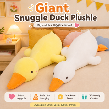Two giant plush duck body pillows, one yellow and one white, lying side by side on a bed in a cozy bedroom setting. The image includes promotional text overlays describing the product as 'Giant Snuggle Duck Plushie' and listing features such as 'Soft & Huggable' and 'Perfect for Lounging'.