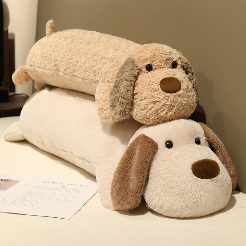 Two plushie dog stuffed animals stacked on top of each other with a neutral background.