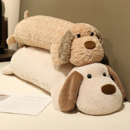 Two plushie dog stuffed animals stacked on top of each other with a neutral background.