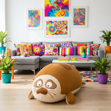 Colorful living room with a sea lion shaped pillow on the floor.
