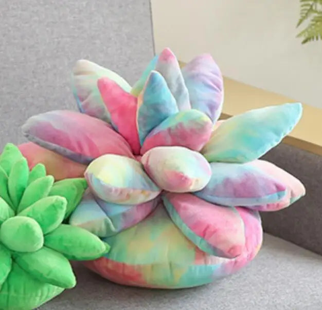 Colorful succulent-shaped plushie pillow on a neutral background