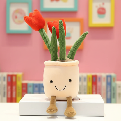 Plush toy flower pot with red tulip flowers on a pink background