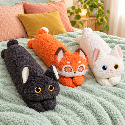 Black, Orange, and White Bright Eyes long cat plush body pillows together on a mint bed.