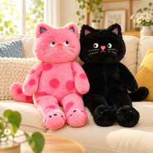 Pink spotted and solid black Polka Paws Cat Plushies together, showing both color choices