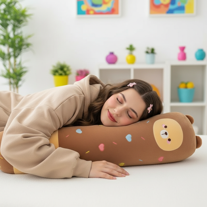 Woman lying on a brown bear-shaped pillow in a room with colorful decor.